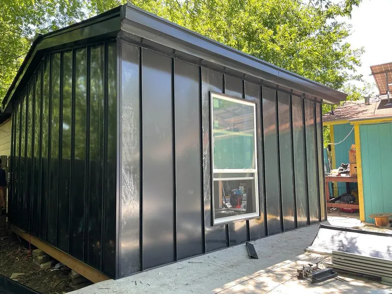 Black standing seam metal wall panels for Roof Inspection in Champaign