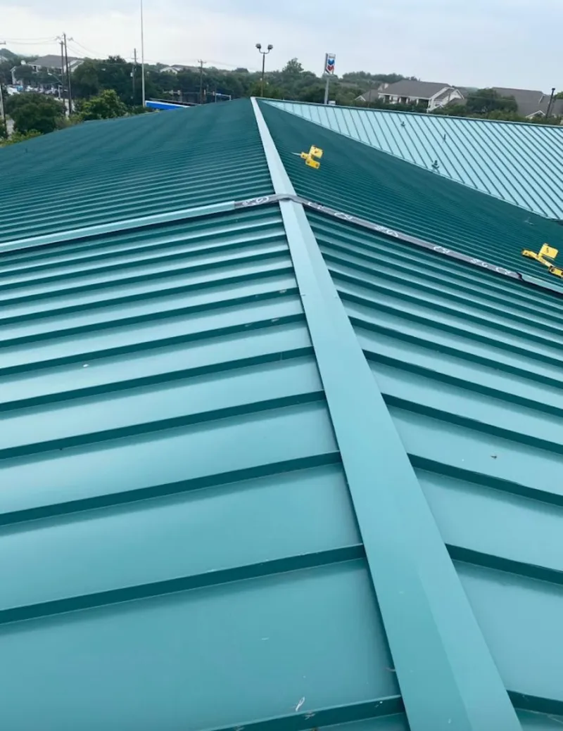 Green commercial metal roof ridge and valley for Metal Roof Repair in Champaign