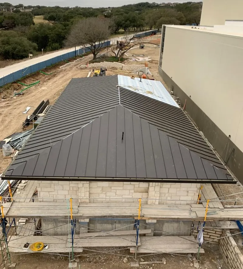 Metal roof new construction with scaffolding in Champaign