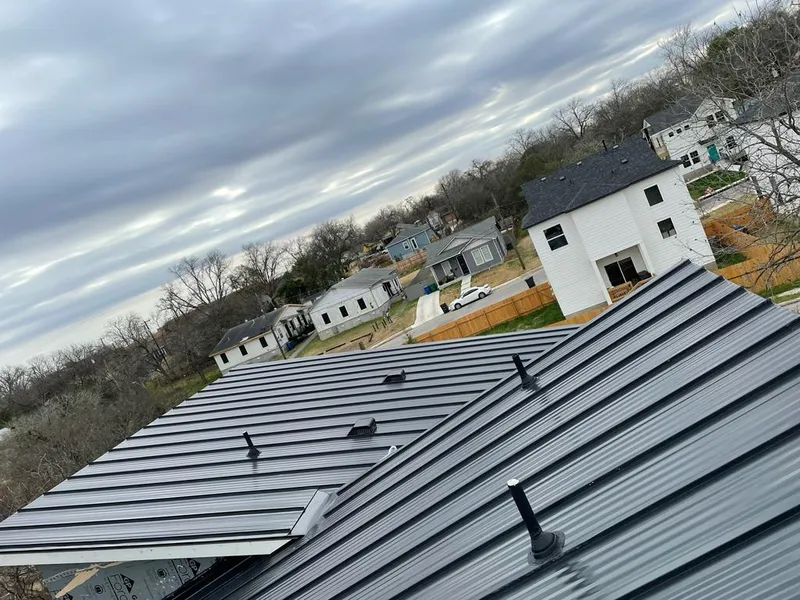 Standing seam metal roof panels with vents for Skylight Repair in Champaign